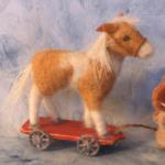 My favourite children's book is 'The Velveteen Rabbit'. This tiny needle felted horse was the 'Skin Horse' in a vyngette that included a 2 inch handmade velveteen rabbit.