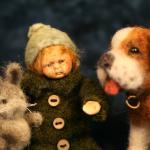 The little people in the photos are created from stone clay with a wire armature. They are about 3 inches tall. The animals are needle felted - sculpted with a single needle and sheep's wool.